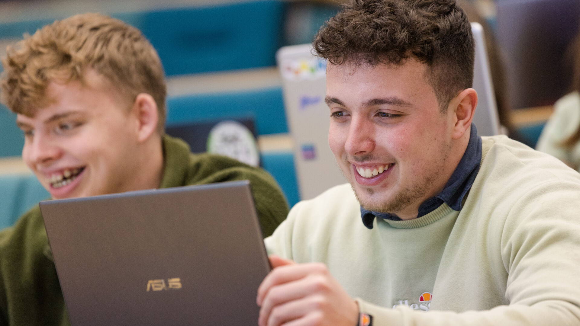 Pair of students in lecture theatre