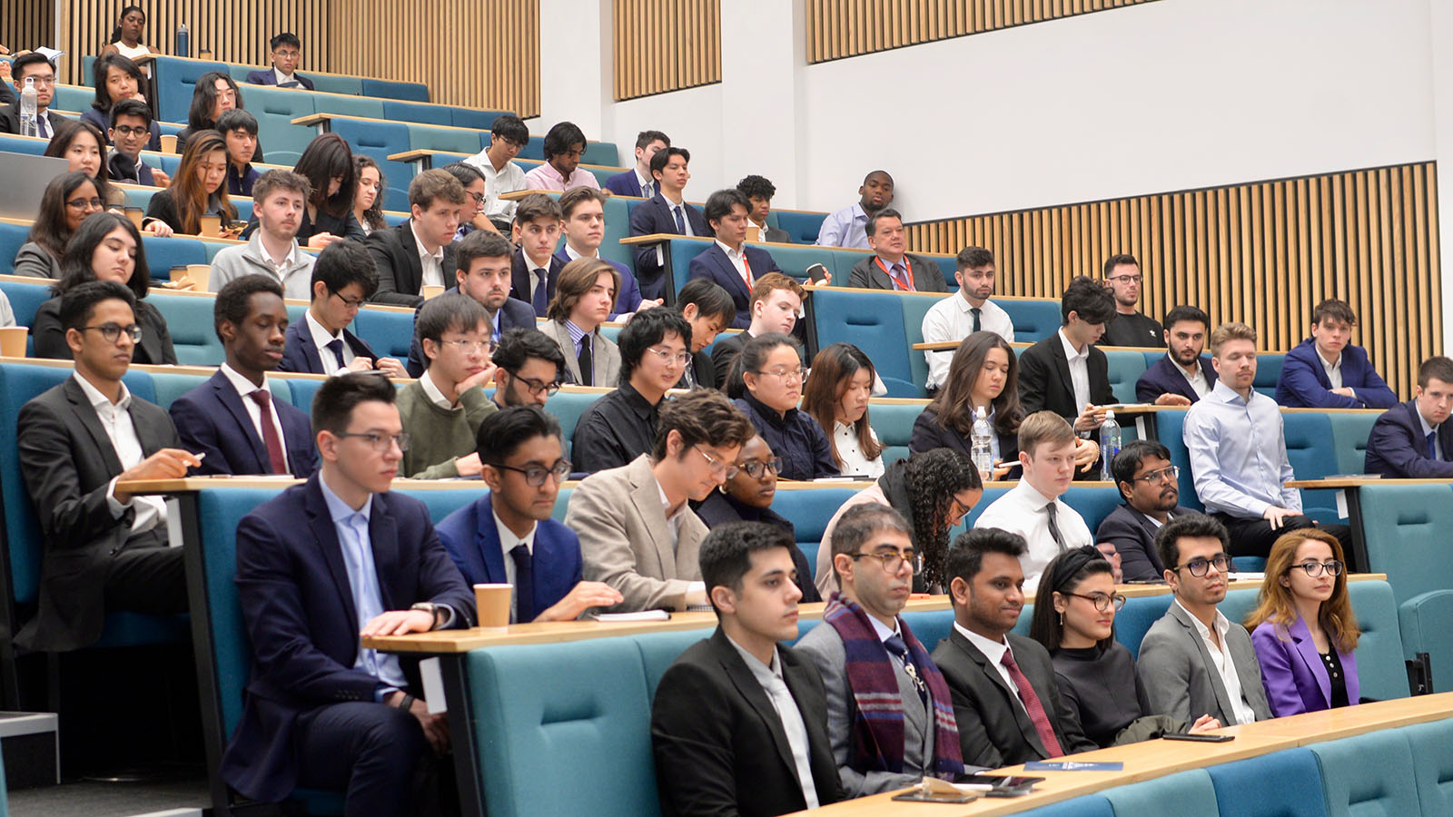 Members of the Ghosal Fund sitting in a lecture theatre