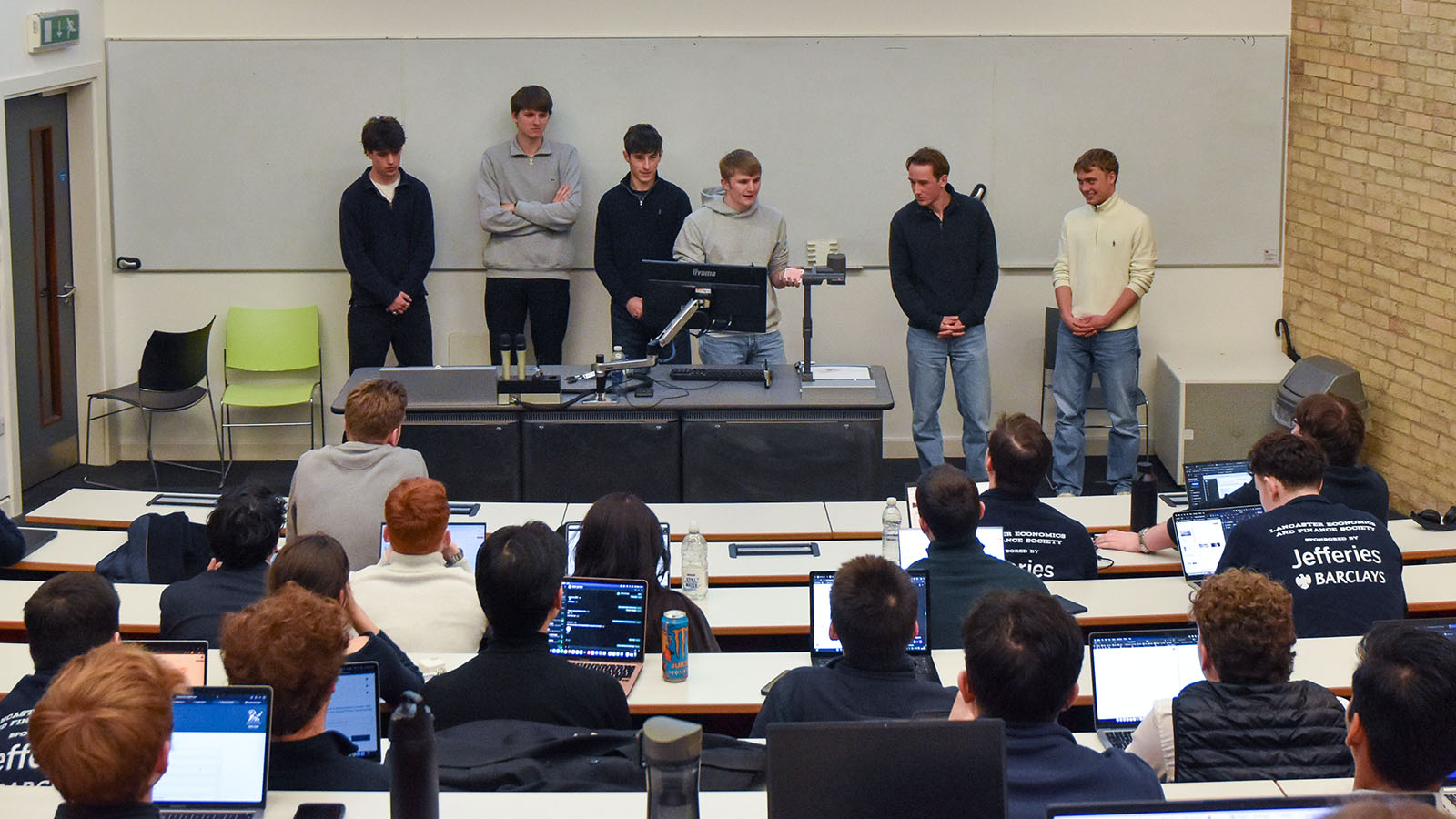 Ghosal Fund members giving a presentation to other members