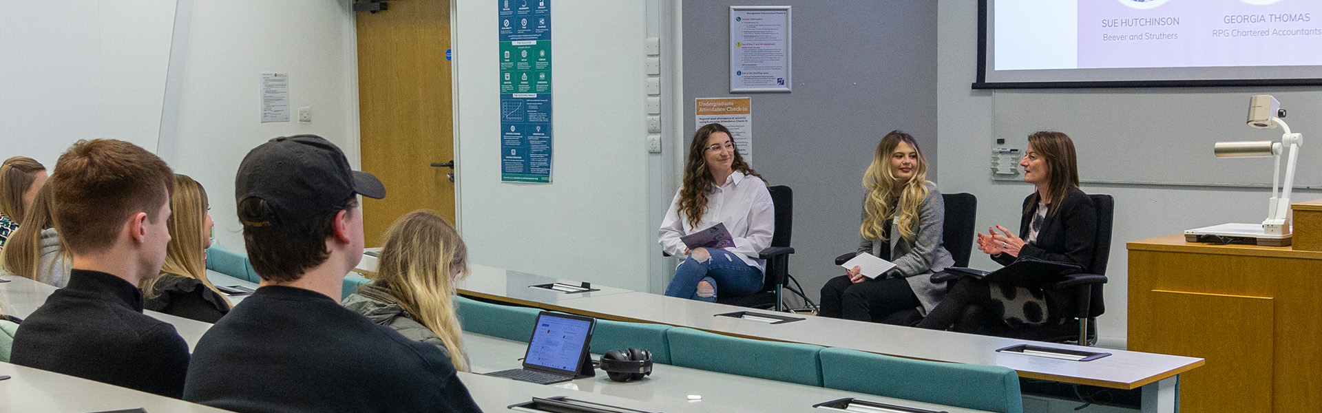 Beth Jones hosting an Accounting Society event in a Management School lecture theatre