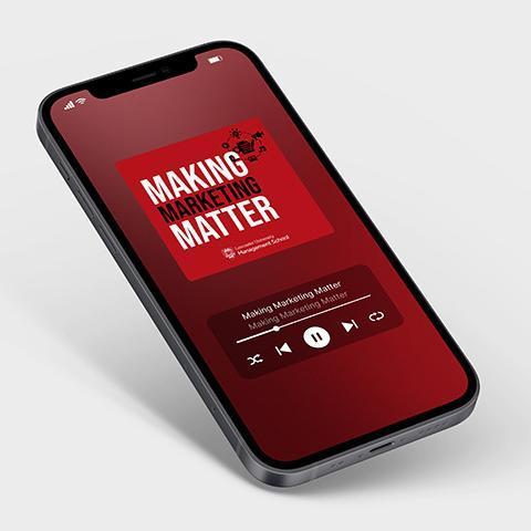 A phone with the Making Marketing Matter podcast playing