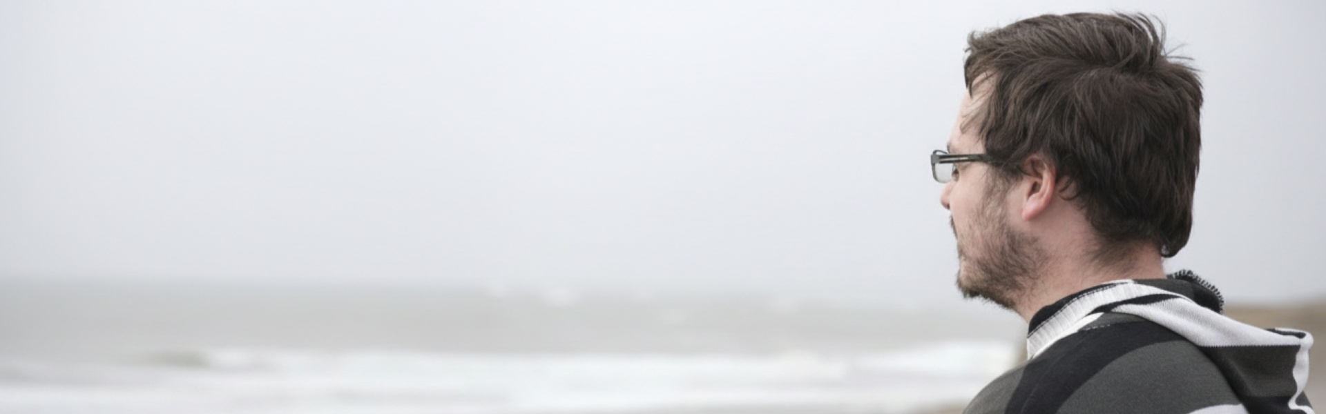 Man looking out to sea
