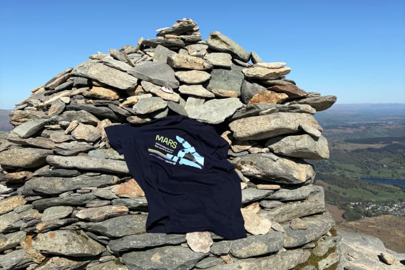 The MARS t-shirt on a cairn at the top of Coniston Old Man 