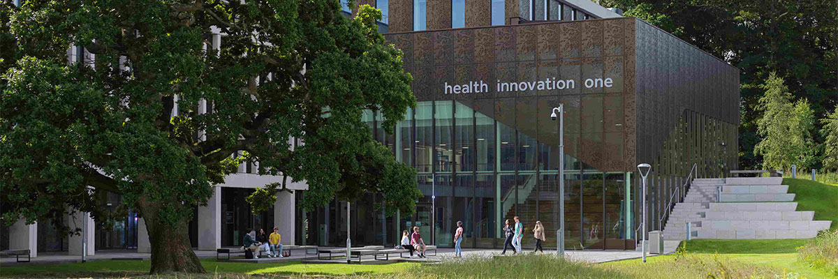Health Innovation One with a large tree in the foreground