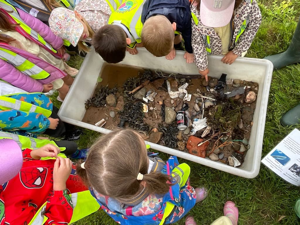 young pupils exploring the soil