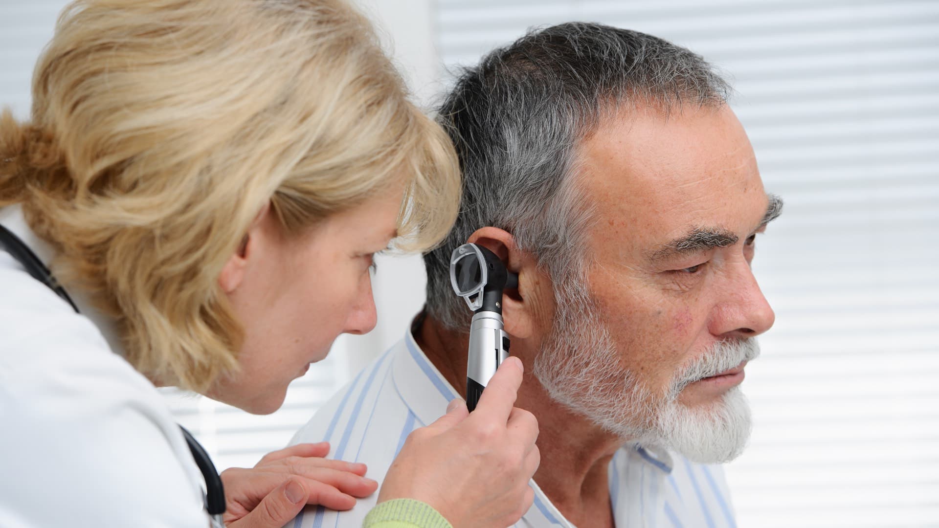 A man has a hearing test.