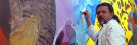 Honduran muralist Javier Espinal, in a masthead image to accompany a blog post by DELC's Cornelia Grabner