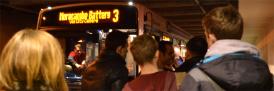 Students catch the bus in the University Underpass