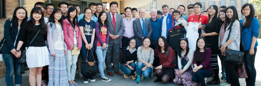 Fan Zhiyi (in blue top with red stripe) outside Lancaster University's Confucius Institute
