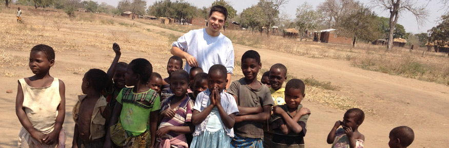 Emanuele with children in a village in Chikhwawa, Malawi – one of the areas worst affected by malaria 