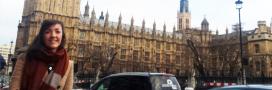 Laura Grace, a PhD student in Lancaster University's Faculty of Health and Medicine, standing outside the UK Houses of Parliament