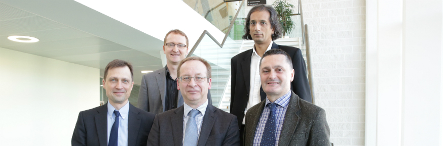 L-R, Back row: Professor Jon Whittle; Professor Awais Rashid. Front: Professor Peter Atkinson; Graham Le Fevre (Raytheon UK); Professor Andrew Atherton