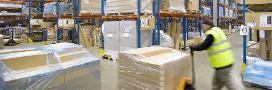 Warehouse worker pushing pallet truck with cardboard boxes - http://www.dreamstime.com/stock-photo-warehouse-worker-pushing-pallet-truck-cardboard-boxes-image41715436#res3784977