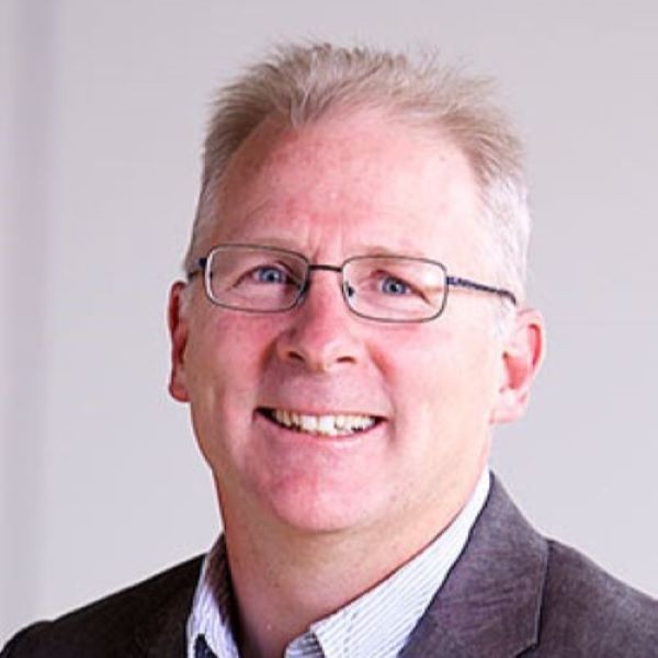 Robert Geyer smiling.
