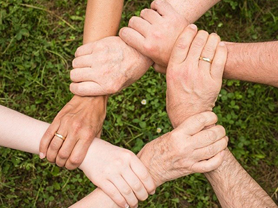 A circle of linked hands