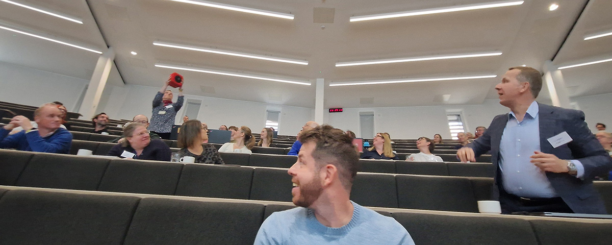 Participants in the MF LT catching the microphone dice. 