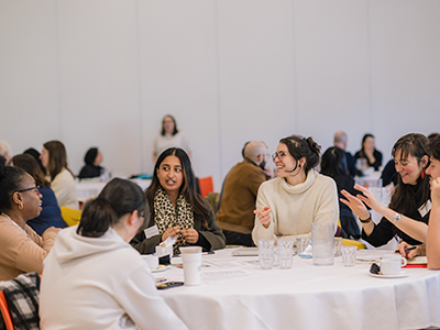 A group of ECR researchers having a discussion at a British Academy event