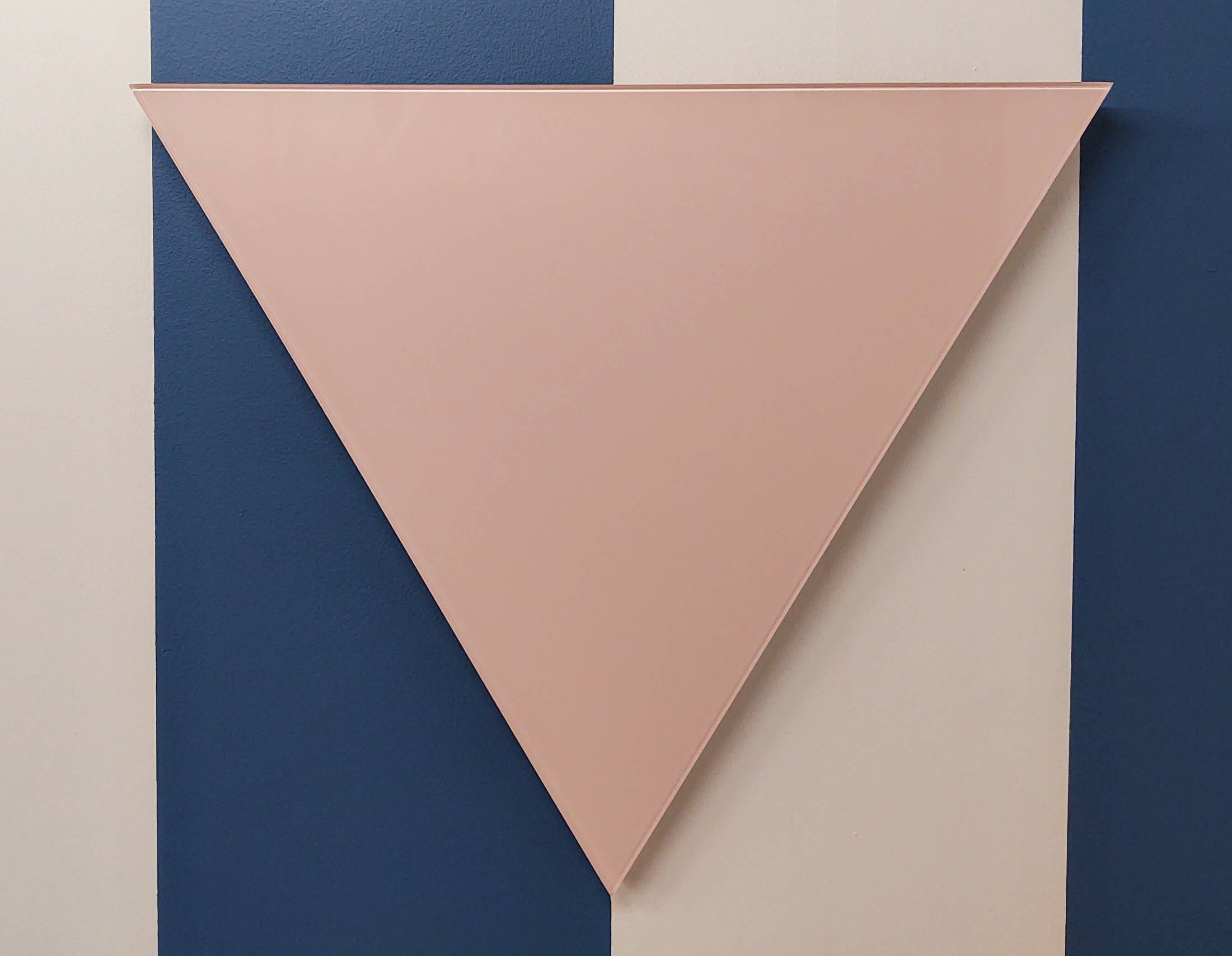 An artwork of a pink triangle.