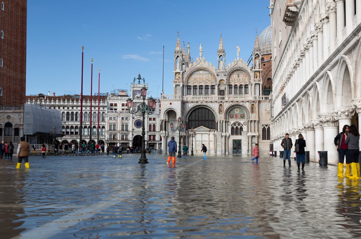 A colour photograph of a flooded St Mark's Square, Venice