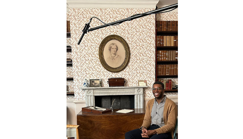 Okey at Haworth Parsonage, the Bronte museum, in the dining room sat in a chair