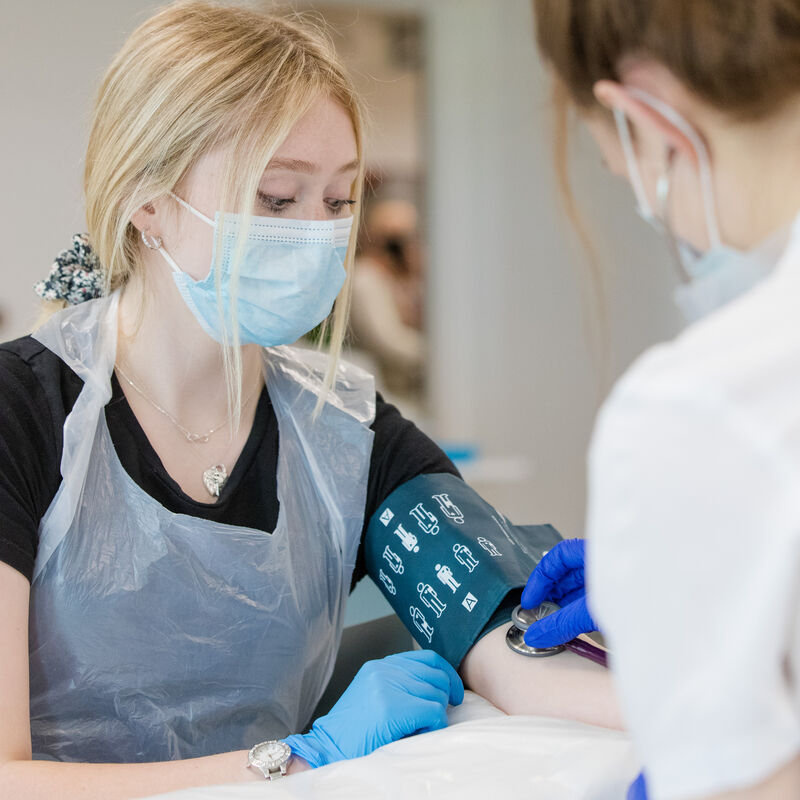 Students testing medical equipment