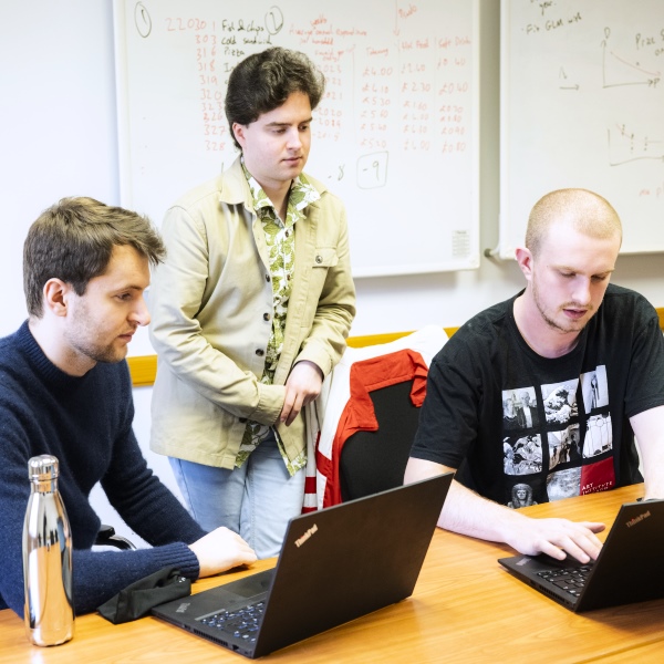 Students stood around laptops at the STOR-i Spring School