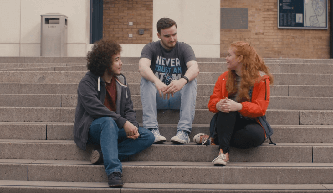 Students chatting outside the learning zone