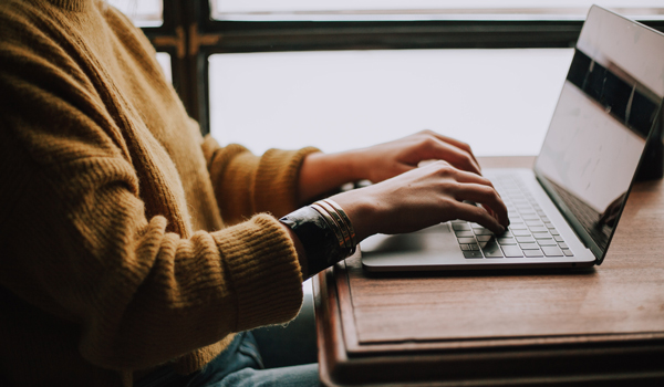 Laptop and hands typing
