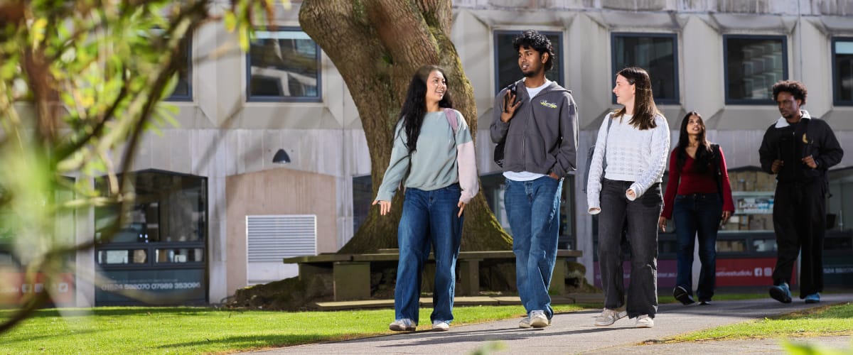 Students walking across County Square.
