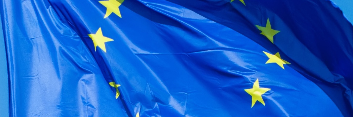 The European flag flying against a blue sky
