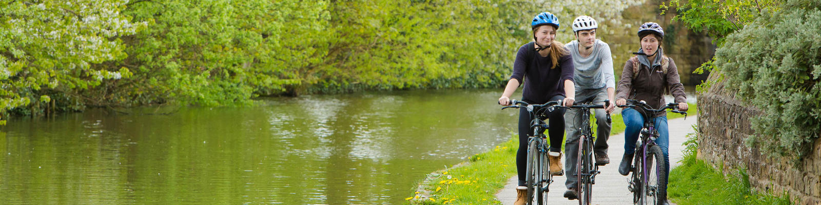 Cyclist riding along the canal