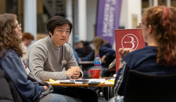 A group of students sat at an event