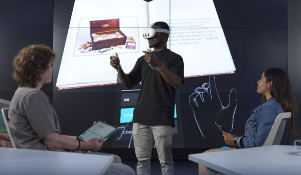 Student stood with a VR headset on
