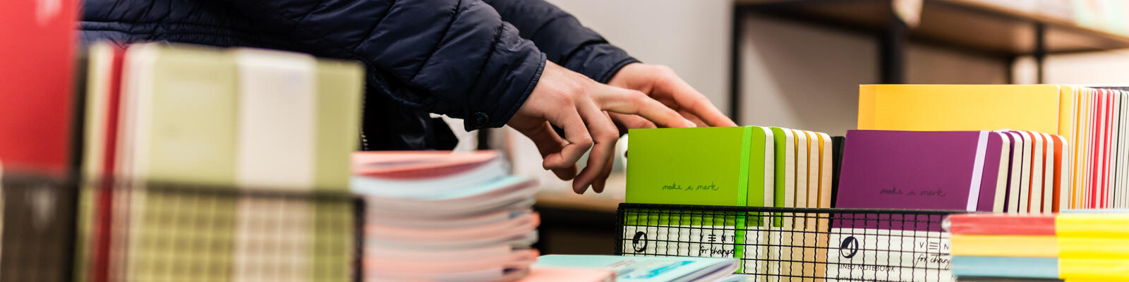 Person buying books