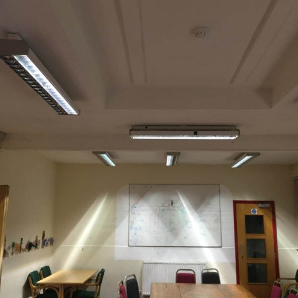 Classroom, whiteboard with information on it.