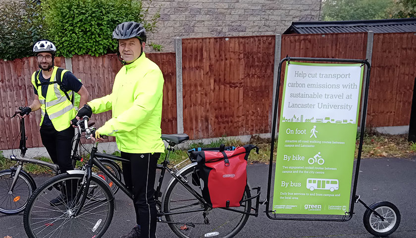 Jonathan Mills with his bike on campus