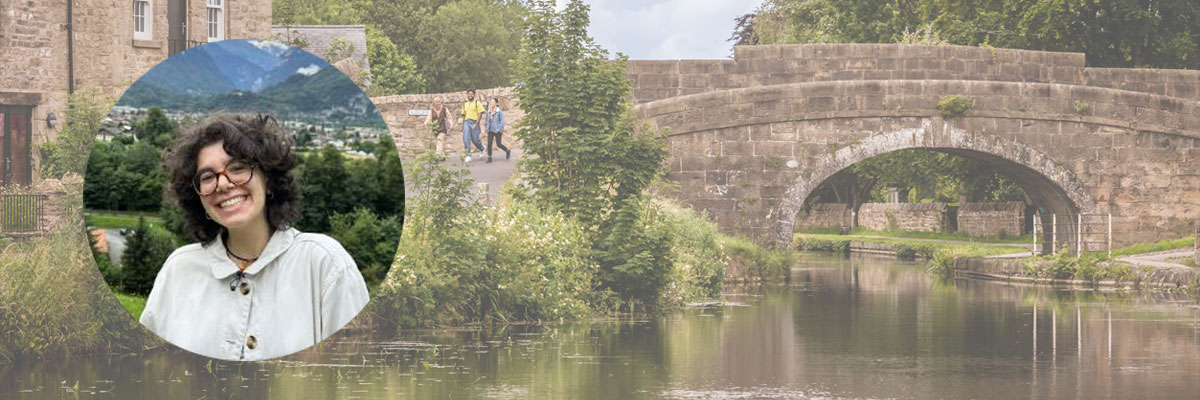 Student profile with scenic view of bridge over Lancaster canal