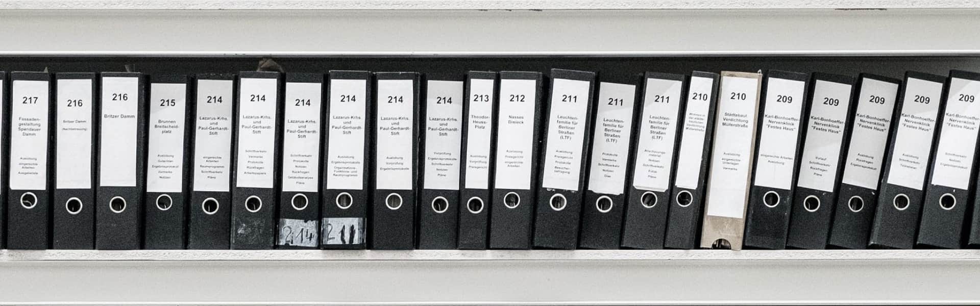 Shelf with a row of document folders