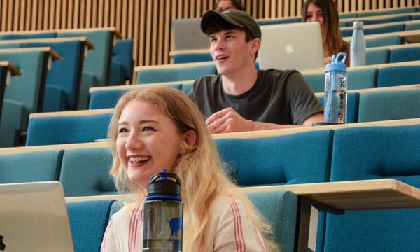 Students sitting in a lecture theatre