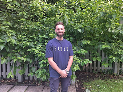 Martin in front of a tree