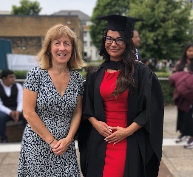 Kate Usher (Success Officer) stood next to a graduating LSP student in 2024