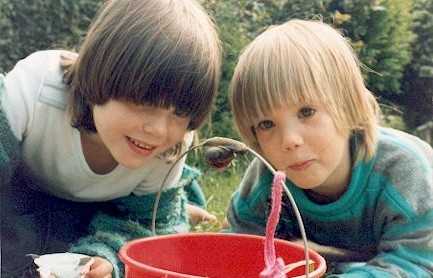 children watching a snail
